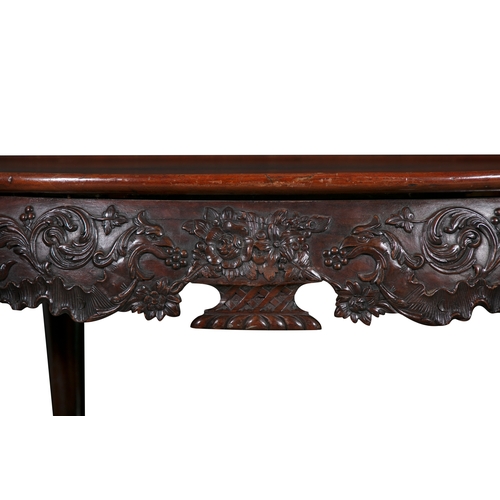 242 - A PAIR OF GEORGE III STYLE MAHOGANY OVAL CENTRE TABLES,  The tray tops with leaf and scroll carved f... 