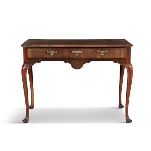 246 - AN IRISH GEORGE II MAHOGANY SIDE TABLE,  the rectangular moulded top over a long frieze drawer fitte... 