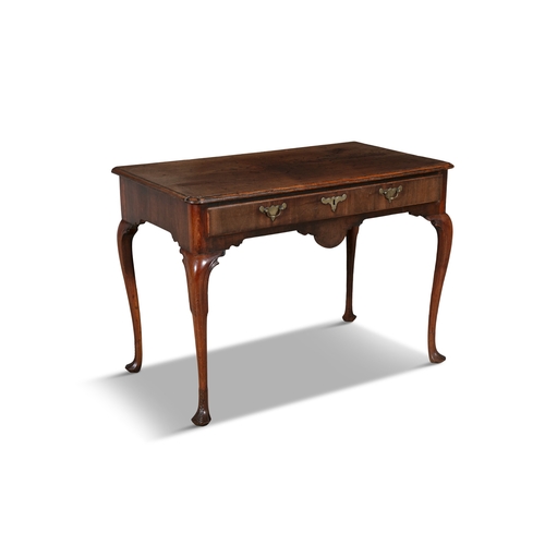 246 - AN IRISH GEORGE II MAHOGANY SIDE TABLE,  the rectangular moulded top over a long frieze drawer fitte... 