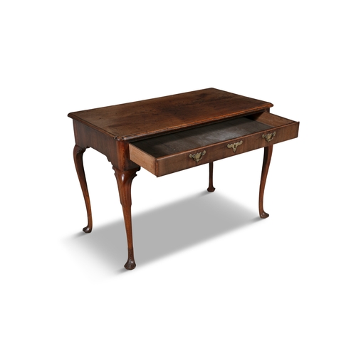 246 - AN IRISH GEORGE II MAHOGANY SIDE TABLE,  the rectangular moulded top over a long frieze drawer fitte... 