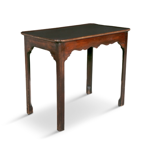 247 - AN IRISH GEORGE III MAHOGANY SIDE TABLE,   the shaped rectangular cavetto top on square chamfered le... 