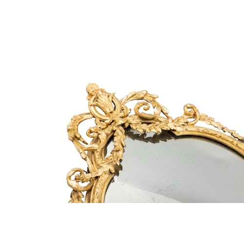 39 - A GEORGE III OVAL GILTWOOD GIRANDOLE WALL MIRROR,   the beaded frame with outer foliate banding and ... 