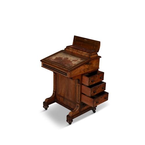 43 - A WALNUT INLAID DAVENPORT,   surmounted with stationary compartment, above hinged writing slope on f... 