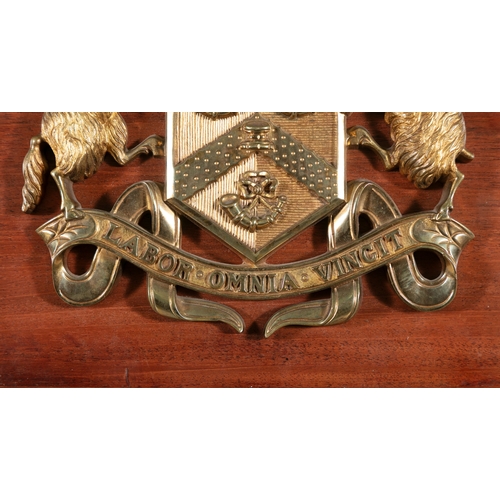 8 - A GILT-METAL ARMORIAL PANEL FOR BRADFORD CITY TRAMWAYS,   mounted on mahogany panel with Latin motto... 