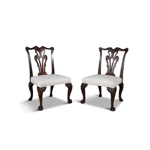 87 - A SET OF FOUR IRISH GEORGIAN MAHOGANY SIDE CHAIRS MID 18TH CENTURY,   each shaped back with double-a... 