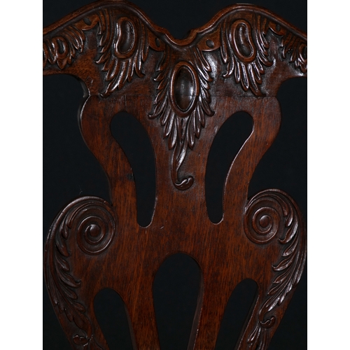 87 - A SET OF FOUR IRISH GEORGIAN MAHOGANY SIDE CHAIRS MID 18TH CENTURY,   each shaped back with double-a... 