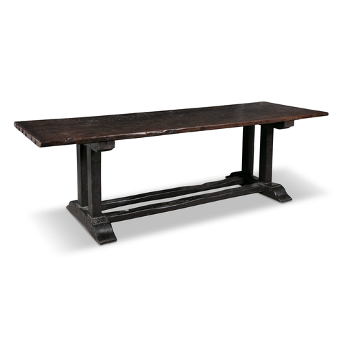 9 - A CONTINENTAL OAK REFECTORY TABLE 17TH CENTURY,   the rectangular two-plank top, raised on trestle-e... 