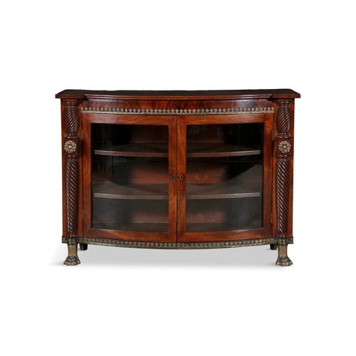 91A - A REGENCY BRASS MOUNTED MAHOGANY BOWFRONT SIDE CABINET,   the twin glazed cupboard doors  below the ... 