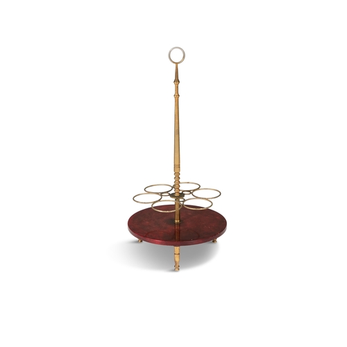 102 - ALDO TURA (1909 - 1963)  A wine bottle stand by Aldo Tura, with brass detailing. Italy c.1960, with ... 