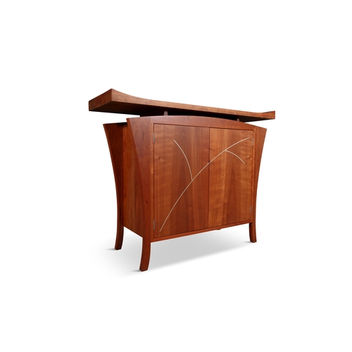 132 - ZELOUF & BELL  A maple two-door side cabinet by Zelouf & Bell. The floating rectangular top with rai... 