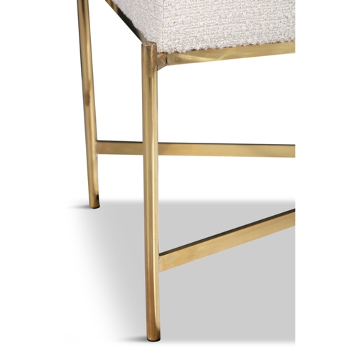 134 - BENCH  A brass framed bench, upholstered in bouclé. Italy. 127 x 47 x 49cm(h)