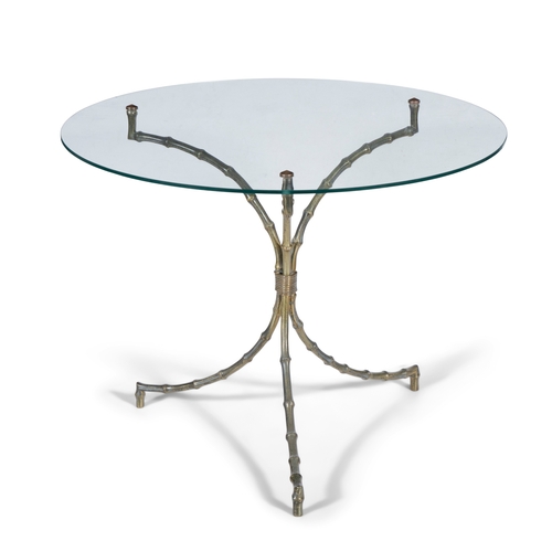 150 - MAISON BAGUES  A brass circular glass topped side table attributed to Maison Bagues. France, c.1970.... 