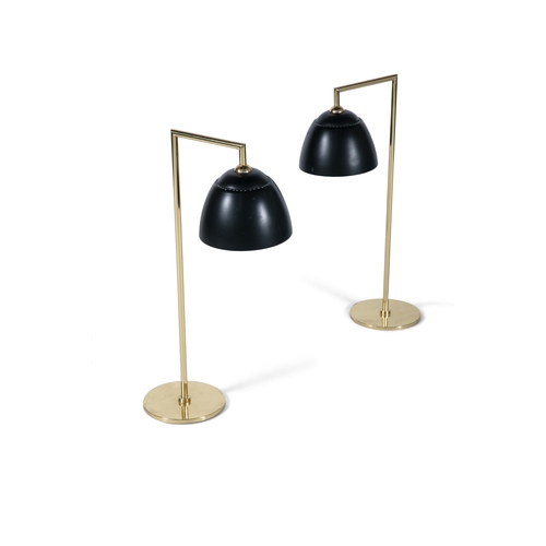 23 - TABLE LAMPS  A pair of gilt metal table lamps with black enamel shades, 71cm(h)