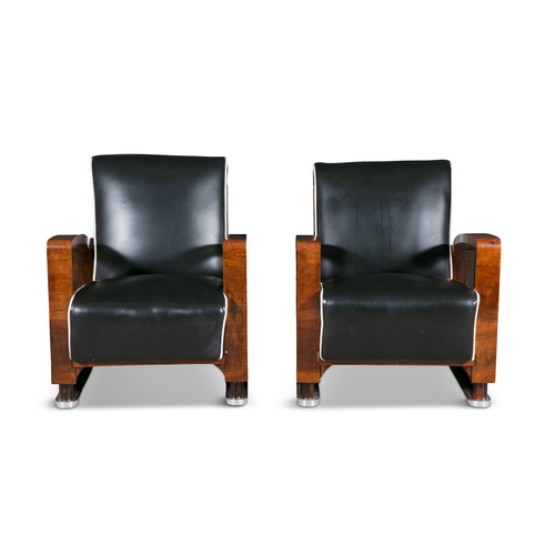 33 - ARMCHAIRS  A pair of Art Deco armchairs in walnut with chrome detailing and leather upholstery. c. 1... 