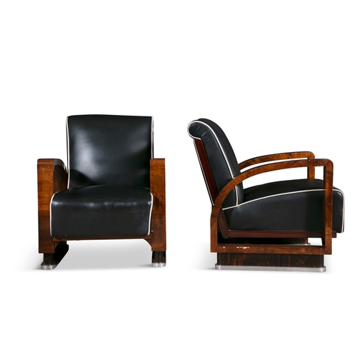 33 - ARMCHAIRS  A pair of Art Deco armchairs in walnut with chrome detailing and leather upholstery. c. 1... 