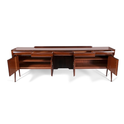 36 - DASSI
A rosewood Dassi sideboard with five doors and drawers with inset glass top and brass detailin... 