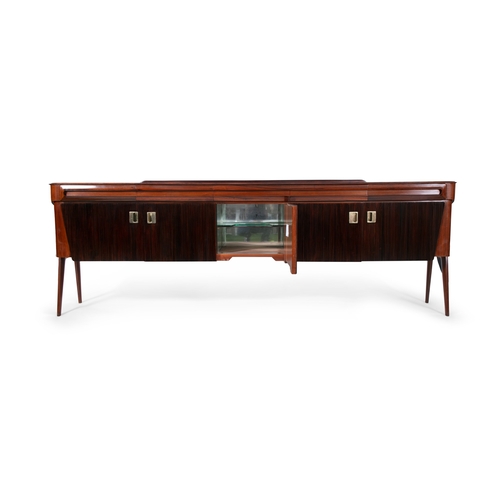 36 - DASSI
A rosewood Dassi sideboard with five doors and drawers with inset glass top and brass detailin... 