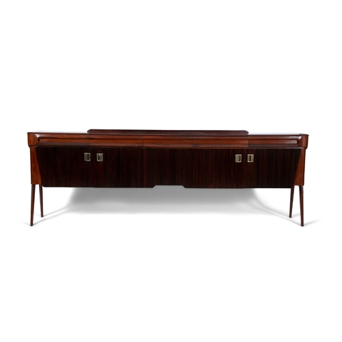 36 - DASSI
A rosewood Dassi sideboard with five doors and drawers with inset glass top and brass detailin... 