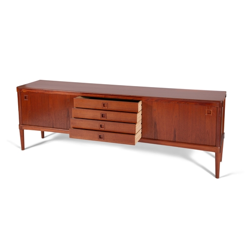 51 - BRAMIN  A teak sideboard by Bramin. Four drawers and two sliding doors. With maker's stamp. Denmark,... 