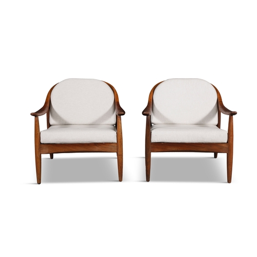 53 - LOUNGE CHAIRS  A pair of lounge chairs in the manner of Finn Andersen. Denmark, c.1960. 70 x 75 x 72... 