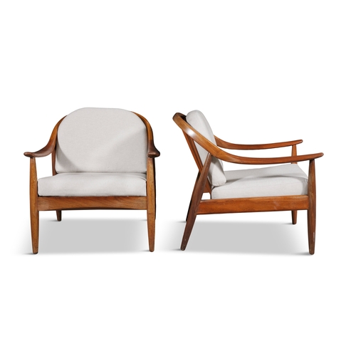 53 - LOUNGE CHAIRS  A pair of lounge chairs in the manner of Finn Andersen. Denmark, c.1960. 70 x 75 x 72... 