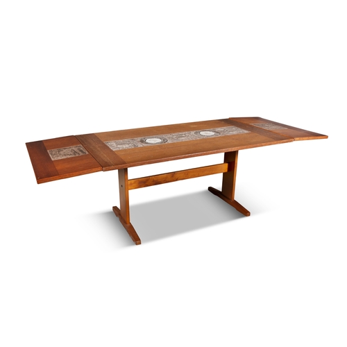 59 - FARSTRUP  A draw leaf teak dining table by Farstrup with tile inserts, Denmark. With maker's label. ... 