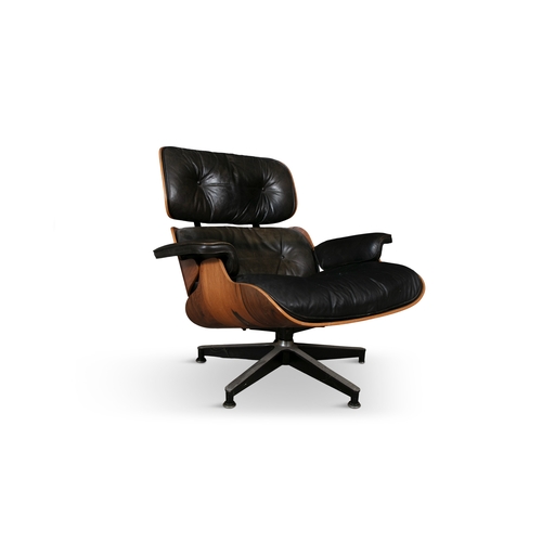 62 - LOUNGE CHAIR  A rosewood lounge chair and footstool by Charles and Ray Eames. c.1970. 85 x 83 x 85cm... 