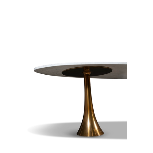 64 - ANGELO MANGIAROTTI (1921 - 2012)  An oval dining table by Angelo Mangariotti on two brass bases with... 