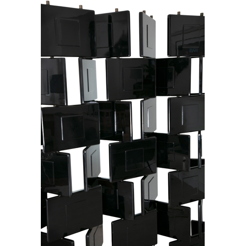 65 - EILEEN GRAY (1878 - 1976)  Brick Screen by Eileen Gray. c.1980. 153 x 172.5cm     This Brick Screen ... 