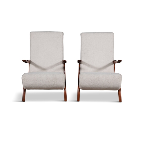 75 - ARMCHAIRS  A pair of armchairs in the manner of Osvaldo Borsani, upholstered in white bouclé. Italy,... 