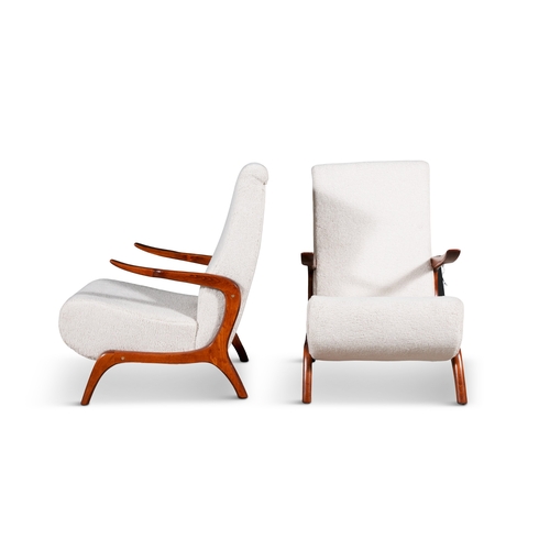 75 - ARMCHAIRS  A pair of armchairs in the manner of Osvaldo Borsani, upholstered in white bouclé. Italy,... 