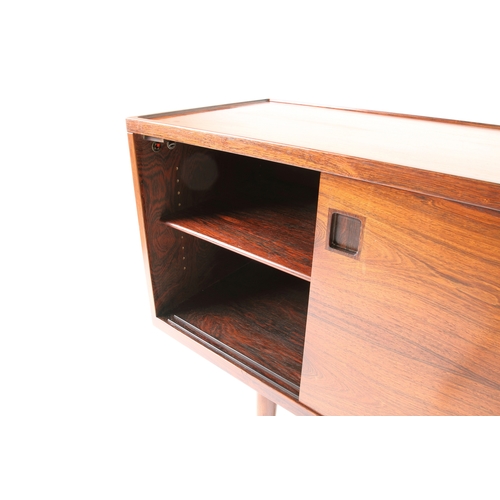 8 - NIELS OTTO MOLLER (1920 - 1982)  A rosewood sideboard by Niels Otto Møller with two sliding doors. D... 