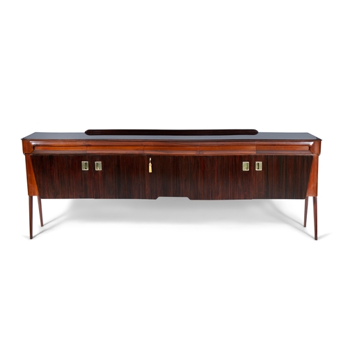 36 - DASSI
A rosewood Dassi sideboard with five doors and drawers with inset glass top and brass detailin... 