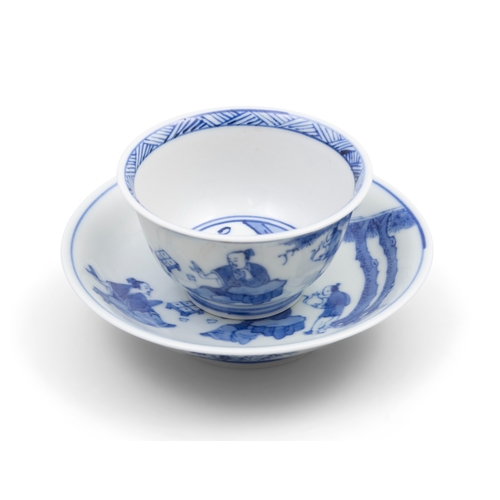 255 - A BLUE AND WHITE TEACUP AND SAUCER SET, MARK CHENG HUA  清康熙  成化款青花下棋图杯碟一套   China, Kangxi period  de... 