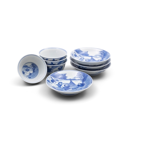 256 - A SET OF FOUR BLUE AND WHITE TEACUPS AND SAUCERS, MARK ZHEN YU TANG  清康熙 珍玉堂款 青花农家乐杯碟一组四套  depicting... 