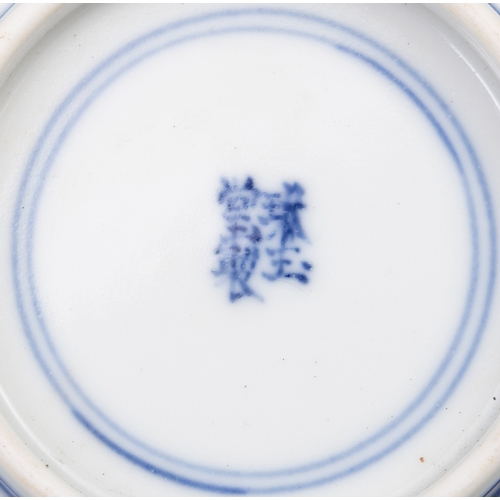 256 - A SET OF FOUR BLUE AND WHITE TEACUPS AND SAUCERS, MARK ZHEN YU TANG  清康熙 珍玉堂款 青花农家乐杯碟一组四套  depicting... 