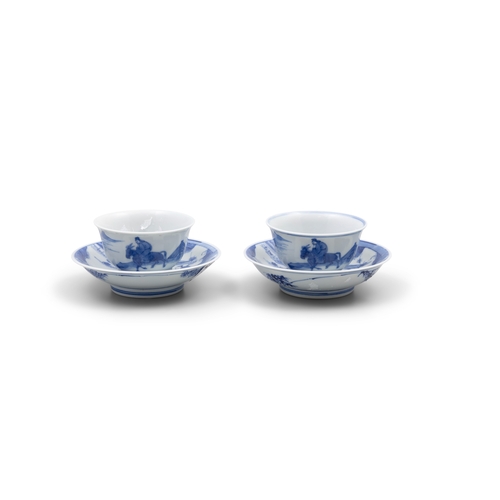 257 - A SET OF TWO BLUE AND WHITE TEACUPS AND SAUCERS, MARK CHENG HUA  清康熙 成化款 青花秋旅图杯碟一组两套  depicting one ... 