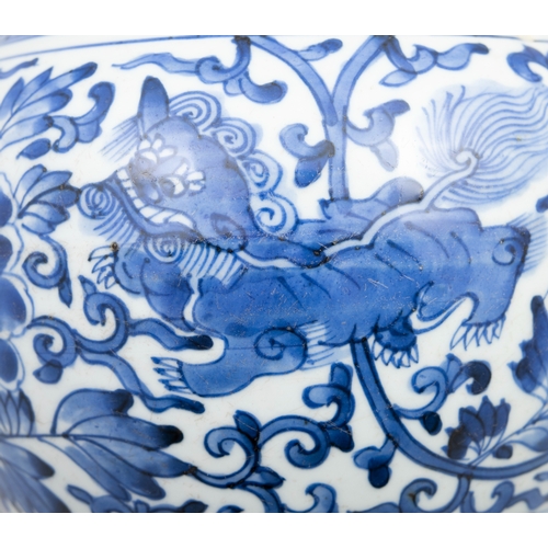 259 - A BLUE AND WHITE 'LION AND PHOENY' WATER JAR  明末清初 青花狮子牡丹纹水罐  China, transition period.  H.16 cm  D.... 