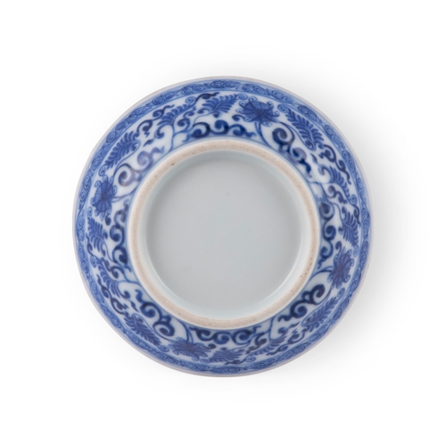 264 - A FINELY PAINTED SMALL BLUE AND WHITE ‘LOTUS’ SAUCER  清乾隆 青花缠枝莲纹小碟  China, Qianlong period (1736-179... 