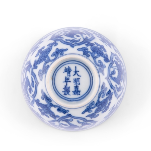 267 - A BLUE AND WHITE ’CRANES AND FRUITS' CUP, JIAJING MARK  20世纪 嘉靖款 青花仙鹤祝寿小杯   China, 20th century   D.... 