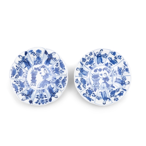 268 - A PAIR OF BLUE AND WHITE 'ELIZA' BOWLS  清康熙 青花仕女赏花小盘一对  China, Kangxi period (1654-1722)  With a gen... 