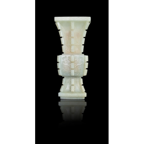 311 - AN ARCHAISTIC CELADON JADE FANG GU VASE  晚清-民国 青玉饕餮纹出戟出戟方觚  China, late Qing - Republic period  of a... 