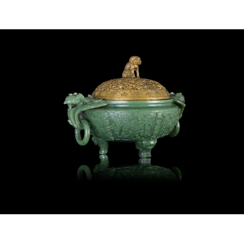 316 - A SPINACH-GREEN JADE ARCHAISTIC TRIPOD INCENSE BURNER  19世纪 碧玉仿古凤鸟纹双耳活环三足炉  China, 19th century  The... 