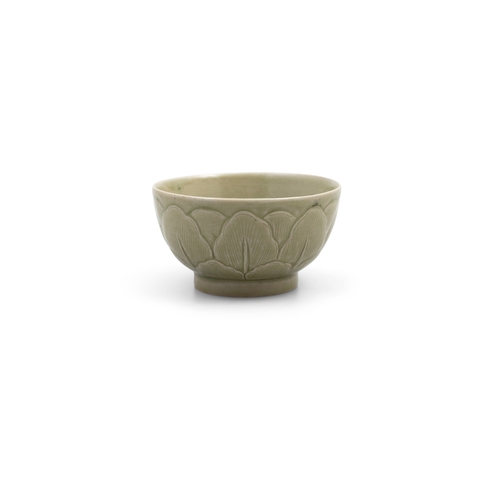 332 - A CARVED YAOZHOU CELADON ‘LOTUS PETAL’ BOWL  五代 耀州青釉莲瓣纹小碗  China, Five dynasties period (1279-1368) ... 