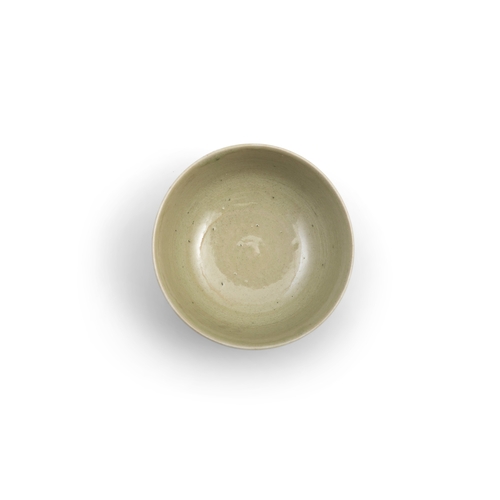 332 - A CARVED YAOZHOU CELADON ‘LOTUS PETAL’ BOWL  五代 耀州青釉莲瓣纹小碗  China, Five dynasties period (1279-1368) ... 