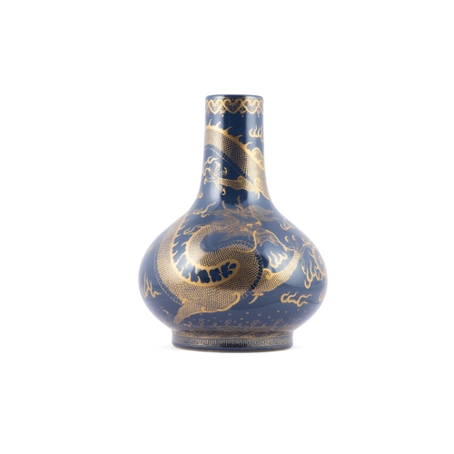 347 - A BLUE GLAZED AND GILT ‘DRAGON’ TIANQIUPING VASE, MARK ‘TONGZHI’  19世纪末 同治款 霁蓝釉描金龙戏珠天球瓶  China, late... 