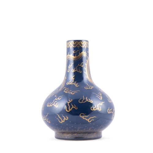 347 - A BLUE GLAZED AND GILT ‘DRAGON’ TIANQIUPING VASE, MARK ‘TONGZHI’  19世纪末 同治款 霁蓝釉描金龙戏珠天球瓶  China, late... 