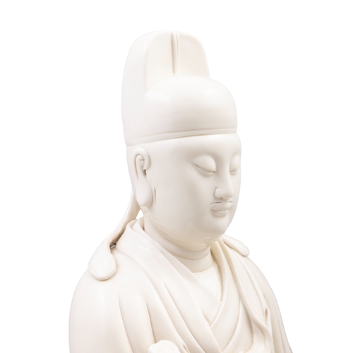 361 - A SITTING BLANC DE CHINE FIGURE OF WENCHANG HOLDING A RUYI  20世纪 德化文昌坐像   China, 20th century.  with... 