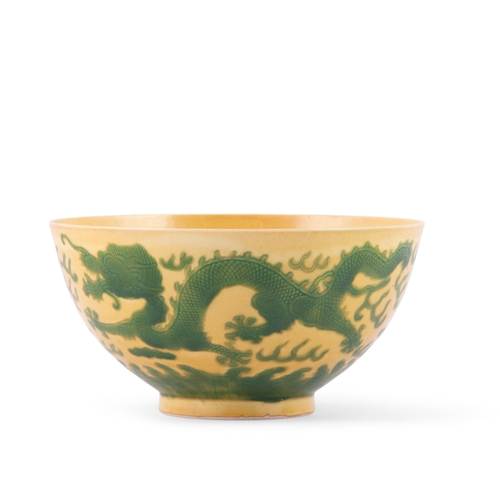 366 - A YELLOW-GROUND GREEN-ENAMELLED INCISED DOUBLE DRAGON BOWL, XUANTONG MARK  20世纪 宣统款 黄釉女绿龙纹碗   China,... 