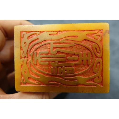 386 - AN INSCRIBED AND DATED 'XIN TIAN ZHU REN' SOAPSTONE SEAL,   清代 双龙教子钮 ‘信天主人’寿山石印章  of rectangular for... 